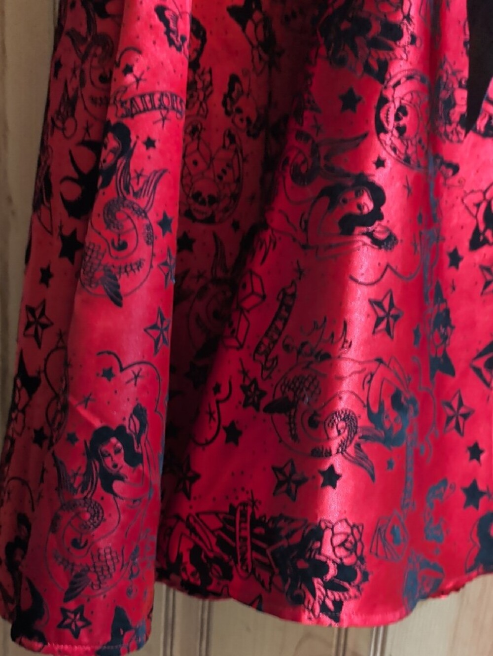 Hell Bunny Red Satin High-Low Dress with Black Trim and Bow Accents - Picture 4 of 9